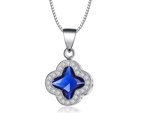 terling Silver Stunning Blue Jewel Surrounded By A Cluster Crystals in a Clover Shape Necklace